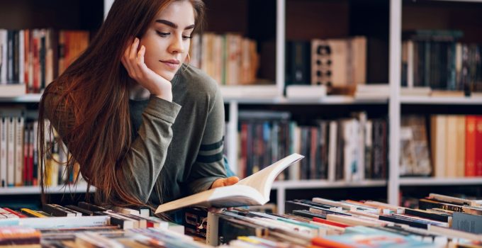 Woman buying books at a bookstore