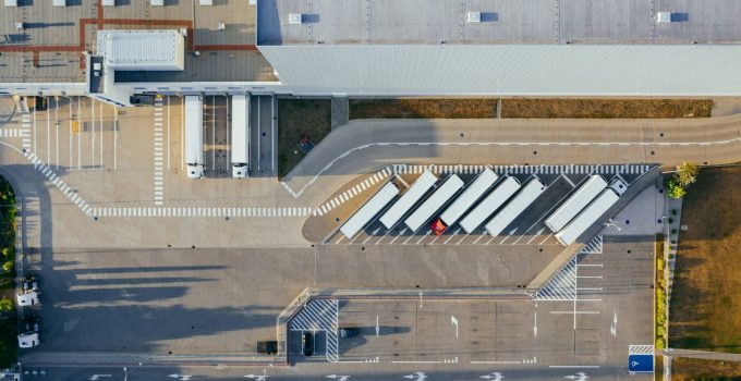 aerial view of vehicles in parking area