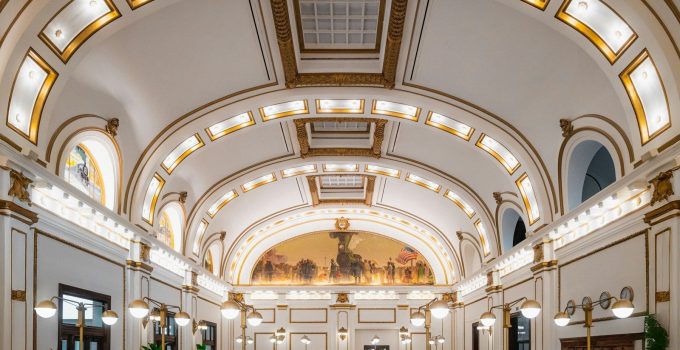 The inside of a large building with high ceilings